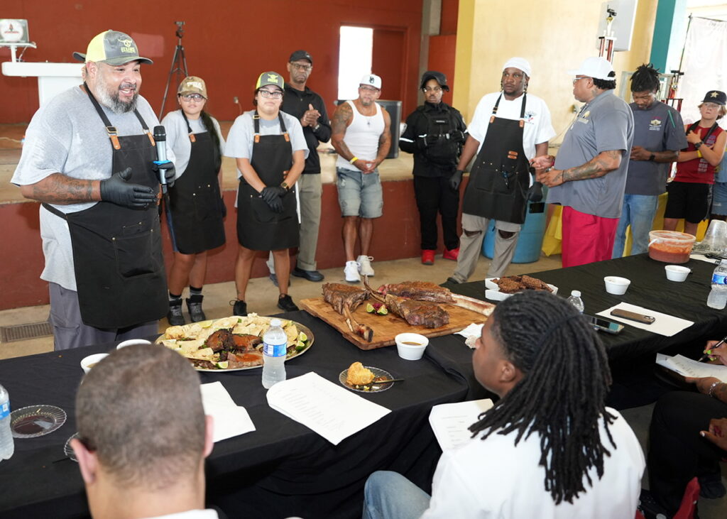 Juan Martinez presents Team Martinez’s entrées to judges during the 11th Annual Community Junior Chef Competition at Mission County Park on July 18, 2026. (Photo by Burrell Parmer)