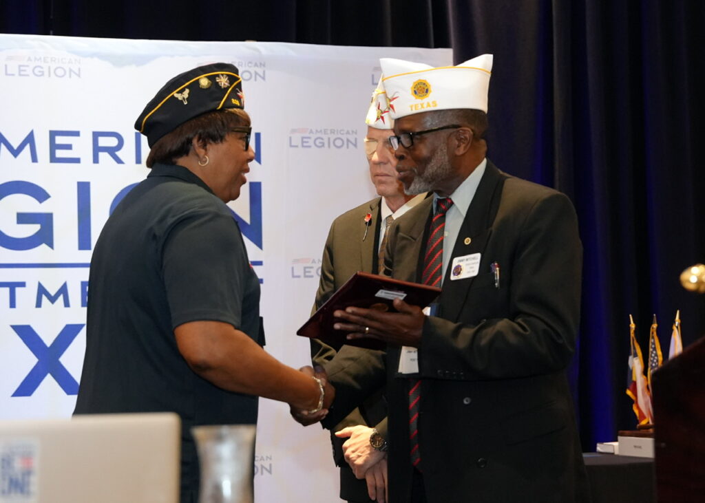 Department Chaplain Jimmy Mitchell presents the Chaplain of the Year Award to Patricia Wimberly of Fred Brock American Legion Post 828 during the American Legion Department of Texas’ 107th Annual Convention on July 12, 2026. (Photo by Burrell Parmer, TEXALPA)