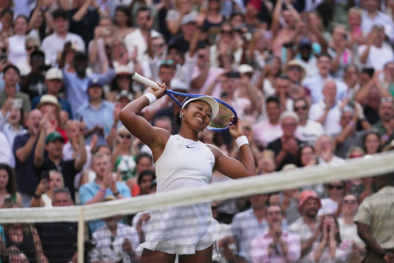 Naomi Osaka of Japan celebrates her victory against Aryna Sabalenka of Belarus in their fourth round women's singles match at the Wimbledon Tennis Championships in London, Sunday, July 5, 2026. (AP Photo/Brian Inganga)