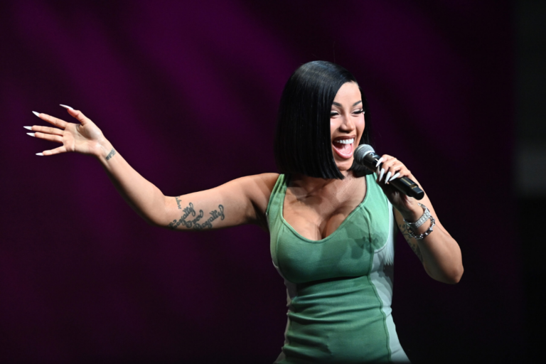 Cardi B speaks onstage during the 2026 ESSENCE Festival of Culture® presented by Coca-Cola® at Ernest N. Morial Convention Center on July 03, 2026 in New Orleans, Louisiana. (Photo by Paras Griffin/Getty Images for ESSENCE)