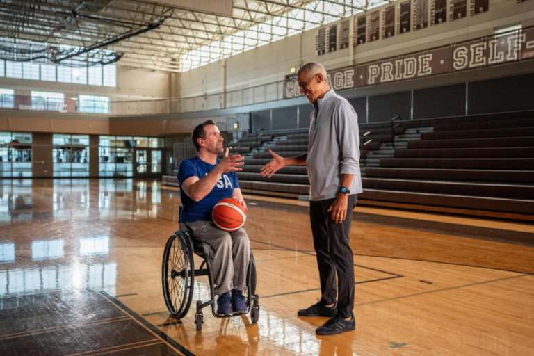 Iowa Rep. Josh Turek shakes hands with former President Barack Obama, who offers his support for the Iowa U.S. Senate candidate as the two shoot hoops in a video released by Turek’s campaign July 29, 2026. (Photo courtesy Turek for Iowa campaign)