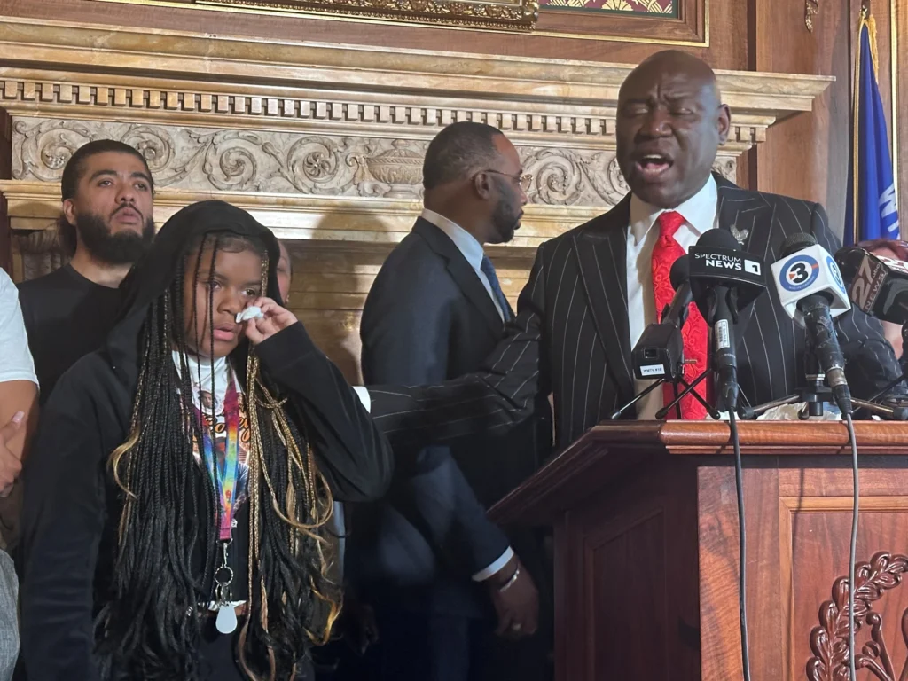 Attorney Ben Crump speaks alongside family members of Corey Ruiz, who was shot and killed by police, Friday, July 24, 2026, in Madison, Wis. (AP Photo/Scott Bauer)