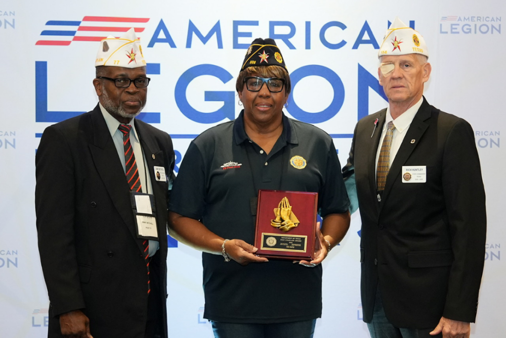 AUSTIN, Texas — Chaplain of the Year Patricia Wimberly stands with Department Chaplain Jimmy Mitchell, left, and Department Commander Richard Huntley during the American Legion Department of Texas’ 107th Annual Convention on July 12, 2026. (Photo by Burrell Parmer, TEXALPA)