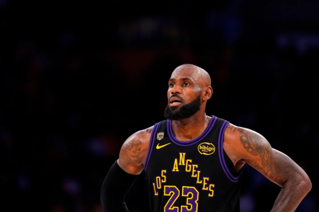Los Angeles Lakers forward LeBron James stands on the court in the closing minutes of Game 4 in a second-round NBA basketball playoffs series against the Oklahoma City Thunder, May 11, 2026, in Los Angeles. (AP Photo/Mark J. Terrill, File)