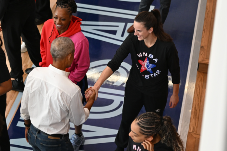 Former President Barack Obama, left, greets WNBA All-Star Caitlin Clark, right, during a practice at the Obama Presidential Center in Chicago, Friday, July 24, 2026. (AP Photo/Paul Beaty)