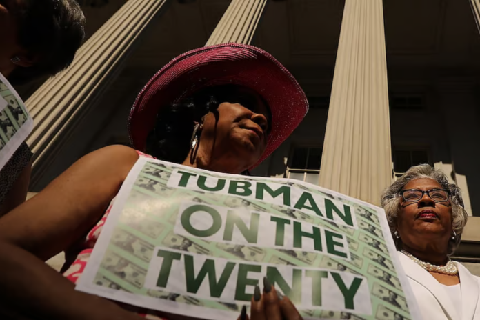 U.S. Rep. Frederica Wilson (D-FL) (C) and Rep. Joyce Beatty (D-OH) (R) rally with fellow House Democrats to demand that American abolitionist heroine Harriet Tubman's image be put on the $20 bill outside the U.S. Treasury Department June 27, 2019 in Washington, DC. Treasury Secretary Steven Mnuchin told a Congressional committee in June that the Bureau of Engraving and Printing would not be able to meet the 2020 deadline for getting Tubman's image on the bill. (Photo by Chip Somodevilla/Getty Images)