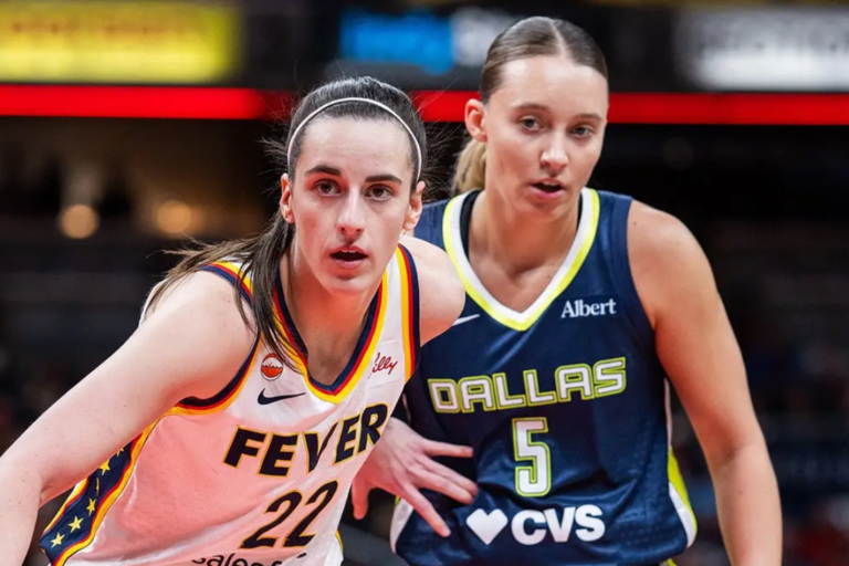 Indiana Fever guard Caitlin Clark and Dallas Wings guard Paige Bueckers compete during an inbounds play in the first half at Gainbridge Fieldhouse in Indianapolis, Ind., on April 30, 2026. (Trevor Ruszkowski/Imagn Images)
