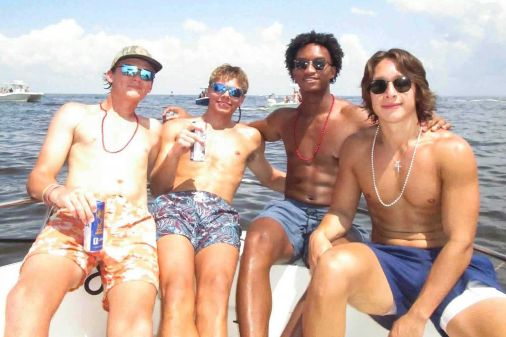 Nolan Xavier Wells, second from right, disappeared while on a trip with friends to Horn Island, just south of Jackson County off of the Mississippi Gulf Coast, on Saturday, July 4, 2026. Photo courtesy Christine Wonsley / Facebook