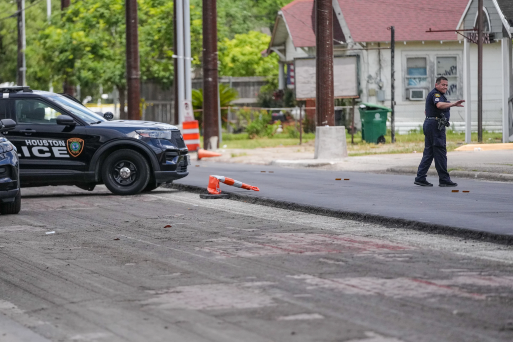 Police work on Canal Street in Houston, Tuesday, July 7, 2026, after a shooting. (Jacob Lujan/Houston Chronicle via AP)