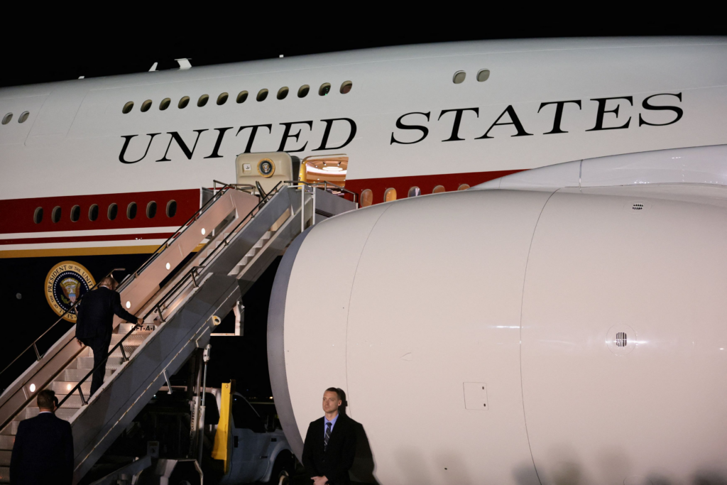 U.S. President Donald Trump boards the new, Qatari-gifted Air Force One after arriving on one of the older planes operating as Air Force One, to return to Washington after his participation in a NATO leaders summit in Turkey, at RAF Mildenhall, in Suffolk, Britain, July 8, 2026. REUTERS/Jonathan Ernst