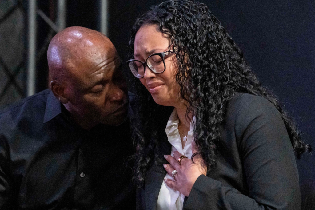 Christine and Elmore Wonsley, parents of Nolan Xavier Wells, react during a news conference at National Action Network headquarters, Friday, July 10, 2026, in New York. (AP Photo/Yuki Iwamura)