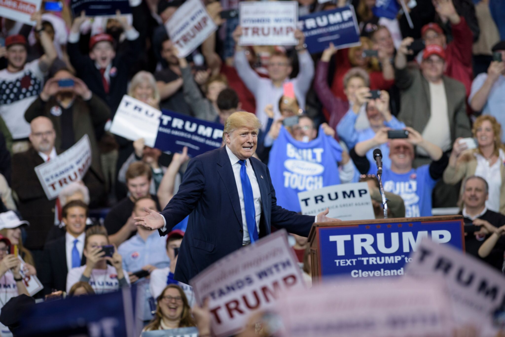 Donald Trump arrives for a rally at the International Exposition Center March 12, 2016 in Cleveland, Ohio. Donald Trump is under fire from rivals who blamed his incendiary rhetoric for a violent outbreak Friday between protesters and supporters at the Republican frontrunner’s rally in Chicago. / AFP / Brendan Smialowski (Photo credit should read BRENDAN SMIALOWSKI/AFP via Getty Images)