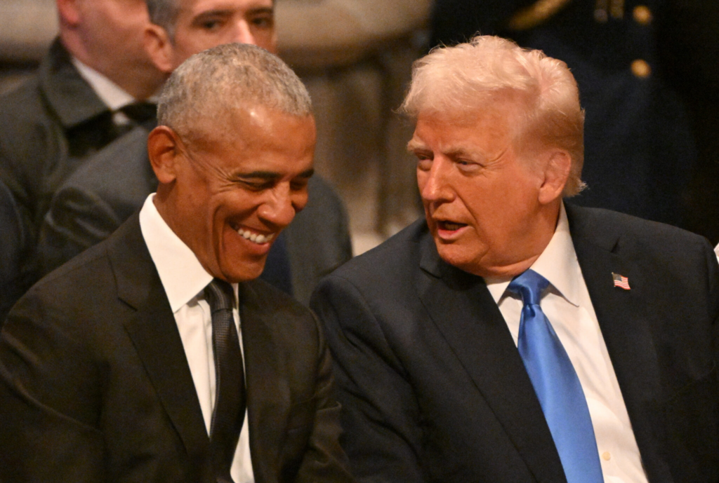  Former US President Barack Obama speaks with President-elect Donald Trump before the State Funeral Service for former US President Jimmy Carter at the Washington National Cathedral in Washington, DC, on January 9, 2025. (Photo by ROBERTO SCHMIDT / AFP) (Photo by ROBERTO SCHMIDT/AFP via Getty Images)