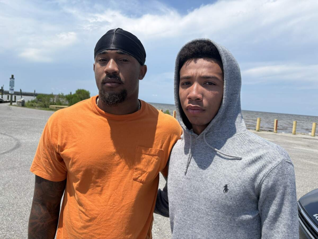 Trace Carter, left, and Jayvon Williams, right, were longtime friends of Nolan Xavier Wells, whose body searchers believe they recovered Monday morning off the western tip of Horn Island. Photo: Anita Lee, Sun Herald