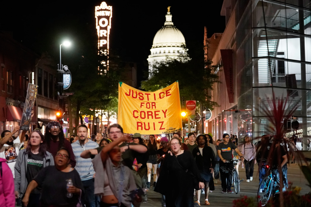 Protesters march past the Capitol, Thursday, July 23, 2026, in Madison, Wis, after a Madison police officer shot and killed Corey Durell Ruiz on Wednesday: (AP Photo/Kayla Wolf)