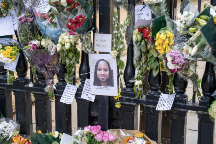 Flowers and cards placed by students and staff outside The Senate House on August 17, 2026 in Cambridge, England. (Photo by Nordin Catic/Getty Images)