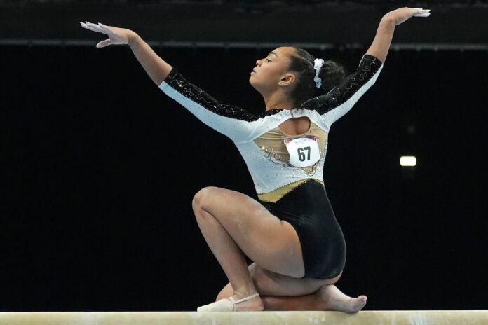 Hezly Rivera competes in the women's balance beam during the U.S. Gymnastics Championships, Sunday, Aug. 9, 2026, in Phoenix. (AP Photo/Ross D. Franklin)