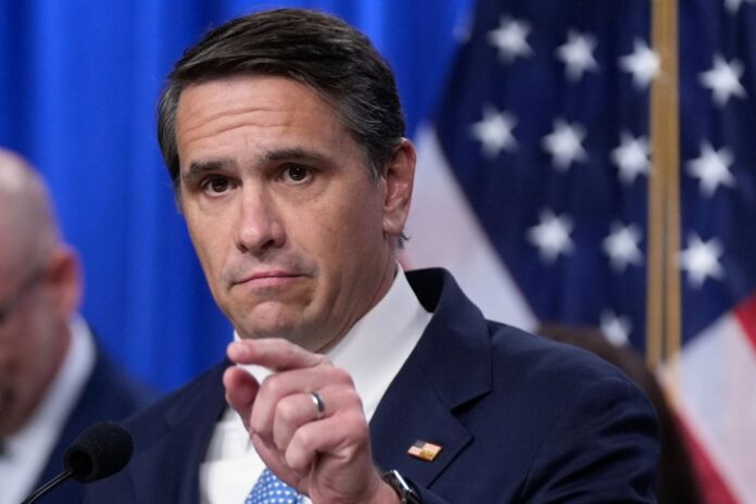 Acting Attorney General Todd Blanche speaks during a news conference on unaccompanied children at the Justice Department, June 11, 2026, in Washington. (AP Photo/Manuel)